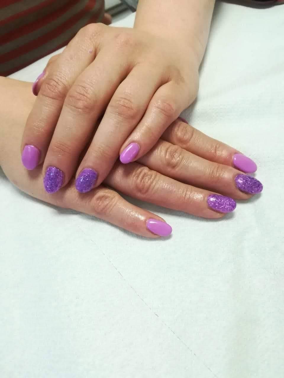 Lilac Shellac with purple glitter accent nails